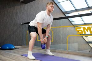 Athlete demonstrating how to squat deeper with an upright torso