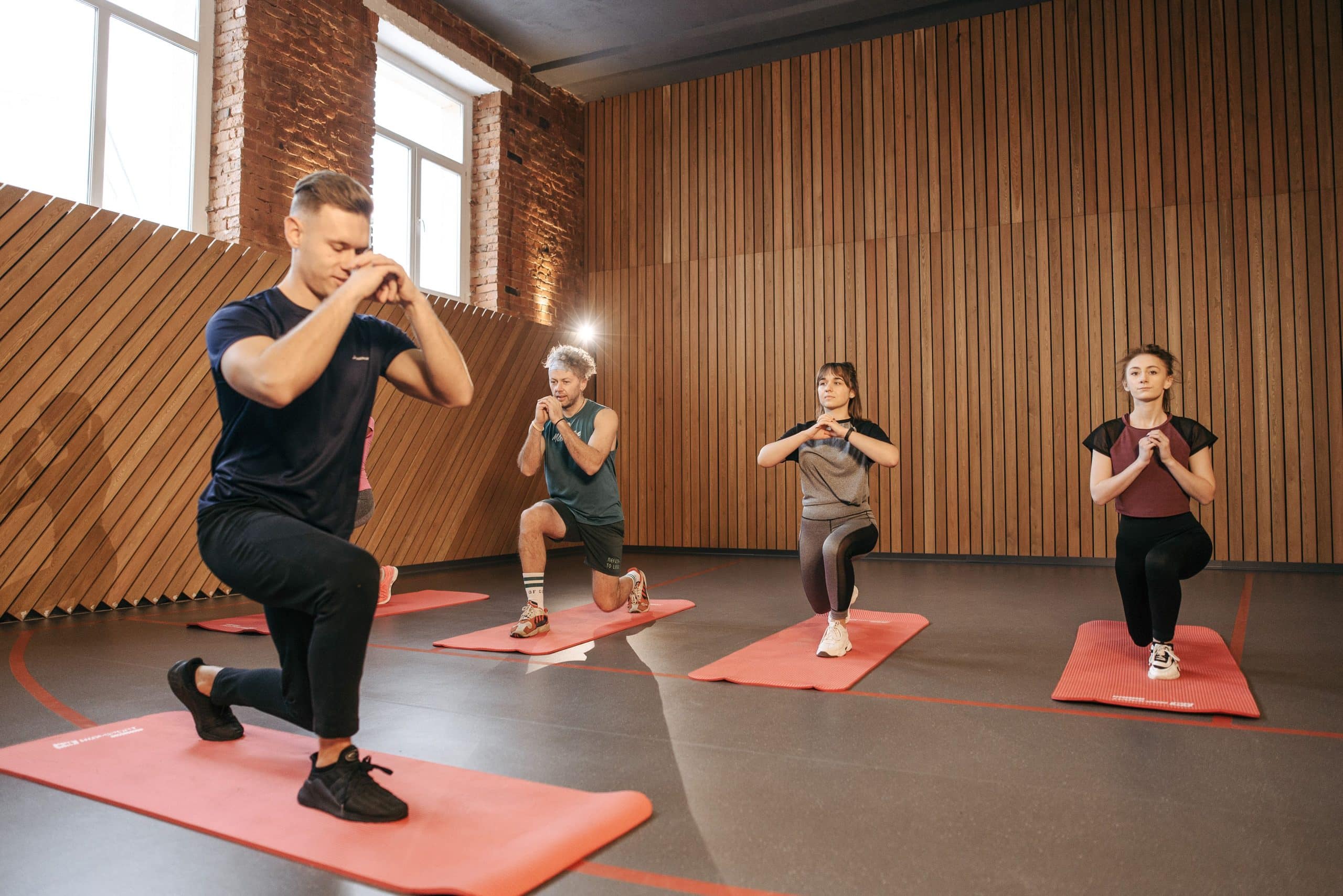 Coach demonstrating the six functional movement patterns