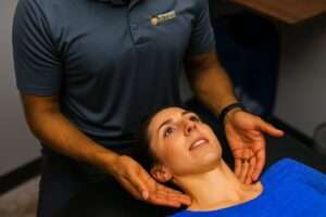 Physical therapy for neck pain session with a Greenville therapist.
